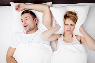 a couple sleeps next to each other | Sleep apnea treatment humble tx