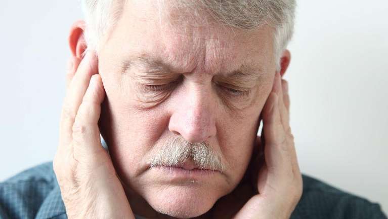 An aged man relaxed his jaw in Humble TX