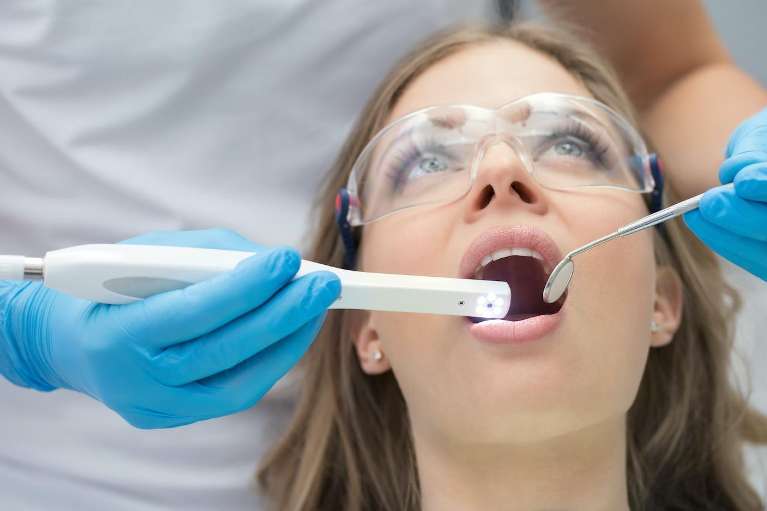 patient at dental exam in Humble, TX