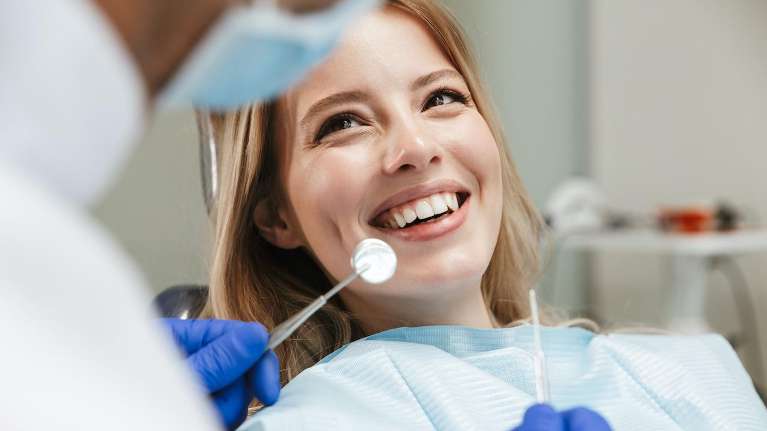 Female patient in Humble TX receiving dental check up